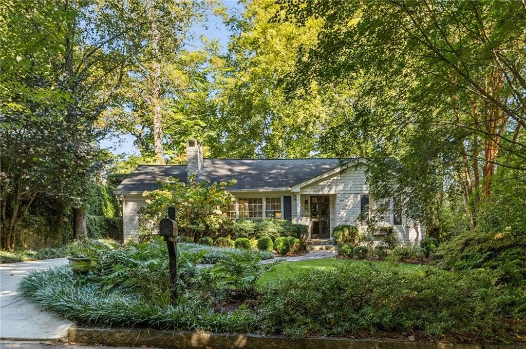 Single story home with a chimney