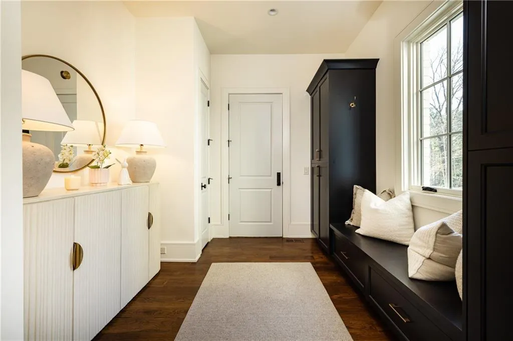 Hallway and cubbies to two car garage