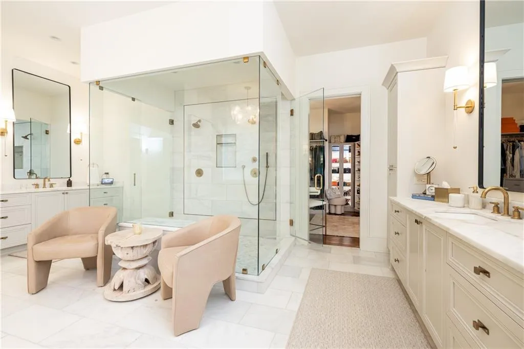 Separate his and her vanities to her closet