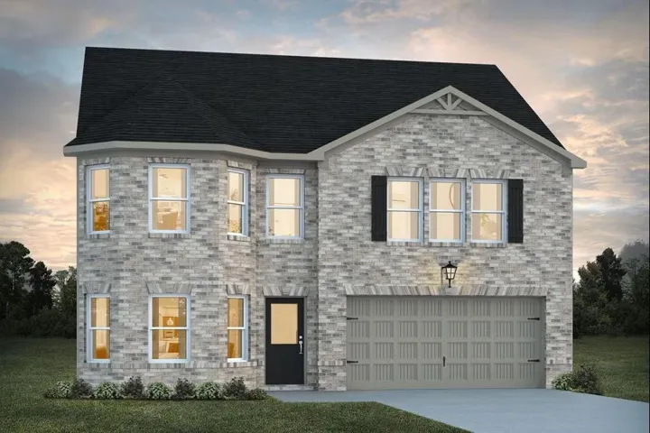 Two-story brick exterior with a dark shingle roof