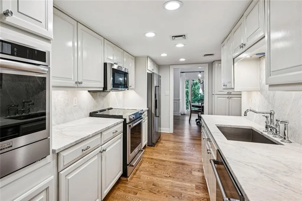 marble counter tops, updated appliances, 2 ovens...