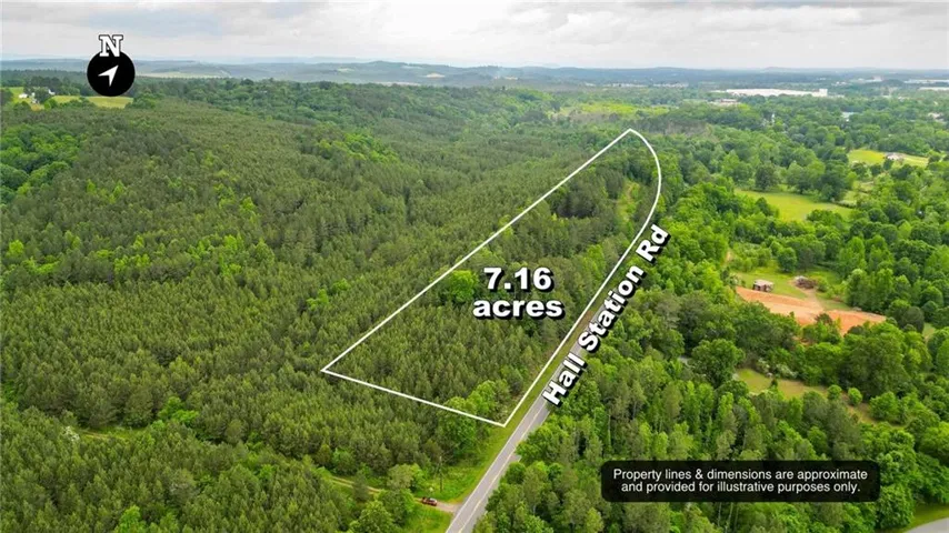 View of property location with property boundaries highlighted and a forest