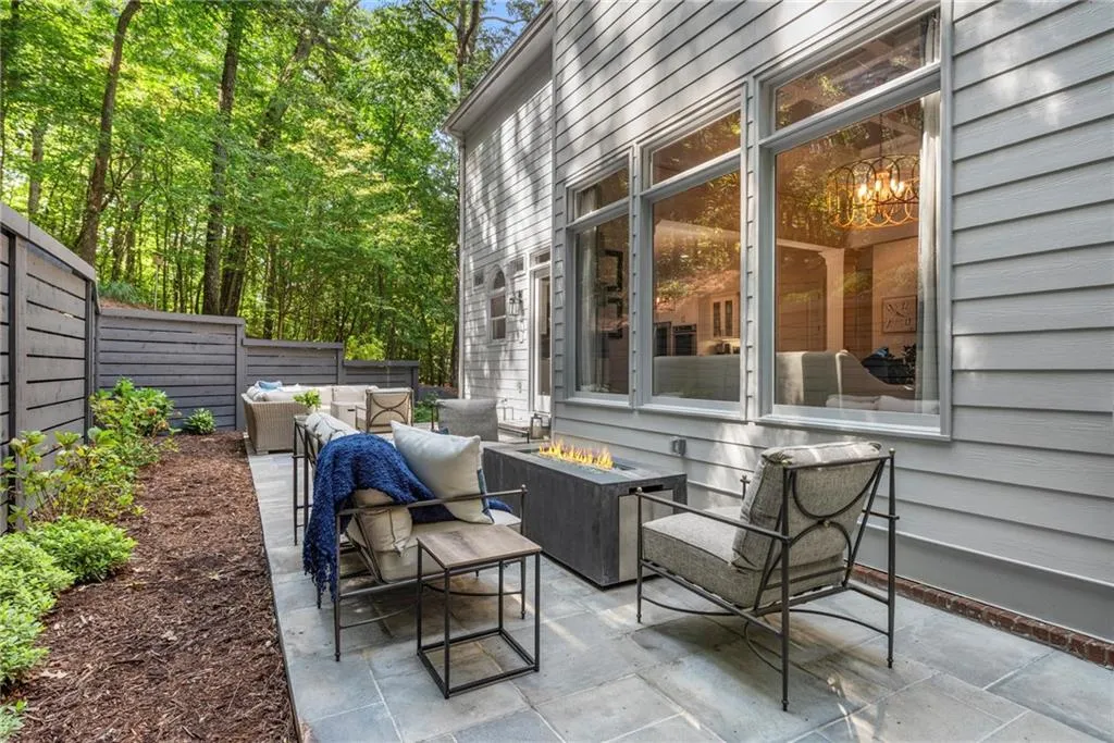 View of patio with an outdoor living space with a fire pit View of patio with an outdoor living space with a fire pit