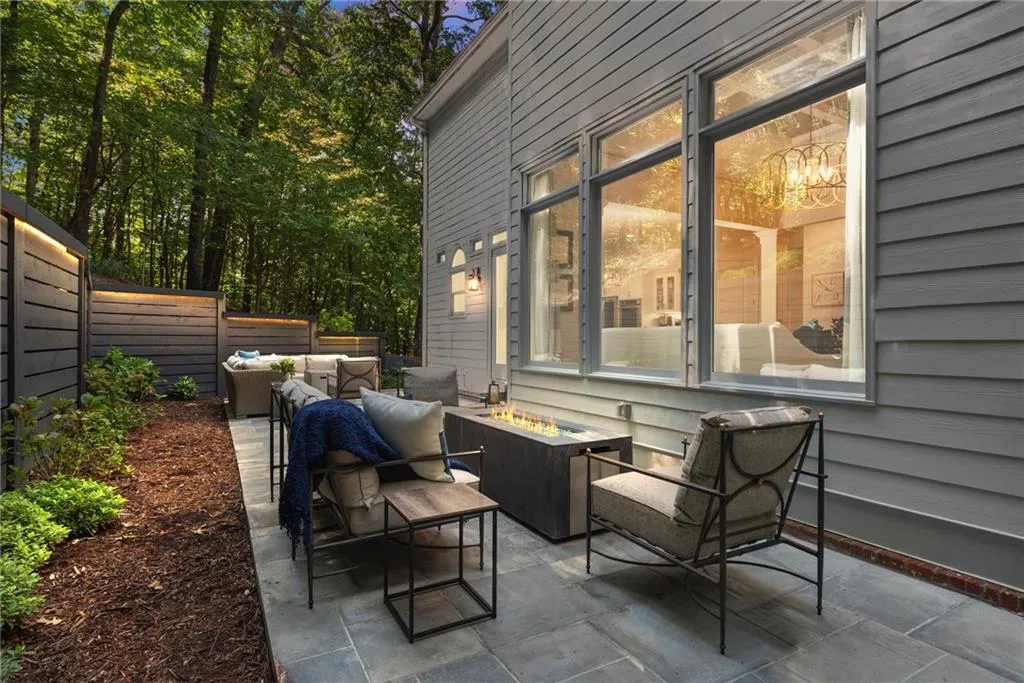 View of patio with an outdoor living space with a fire pit View of patio with an outdoor living space with a fire pit