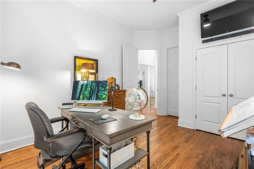 Bedroom/Home office featuring a closet, ceiling fan and access to the main bathroom Bedroom/Home office featuring a closet, ceiling fan and access to the main bathroom