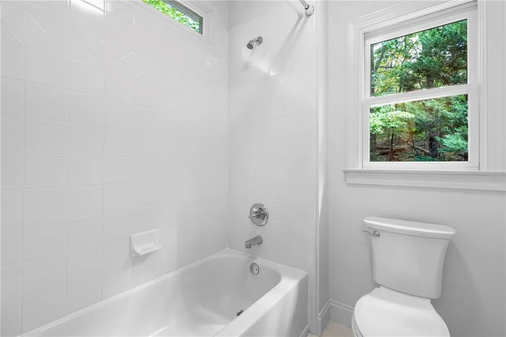 Guest Bathroom featuring shower/tub Guest Bathroom featuring shower/tub