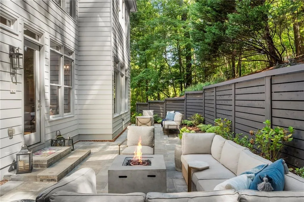 Patio and an outdoor living space with a fire pit Patio and an outdoor living space with a fire pit