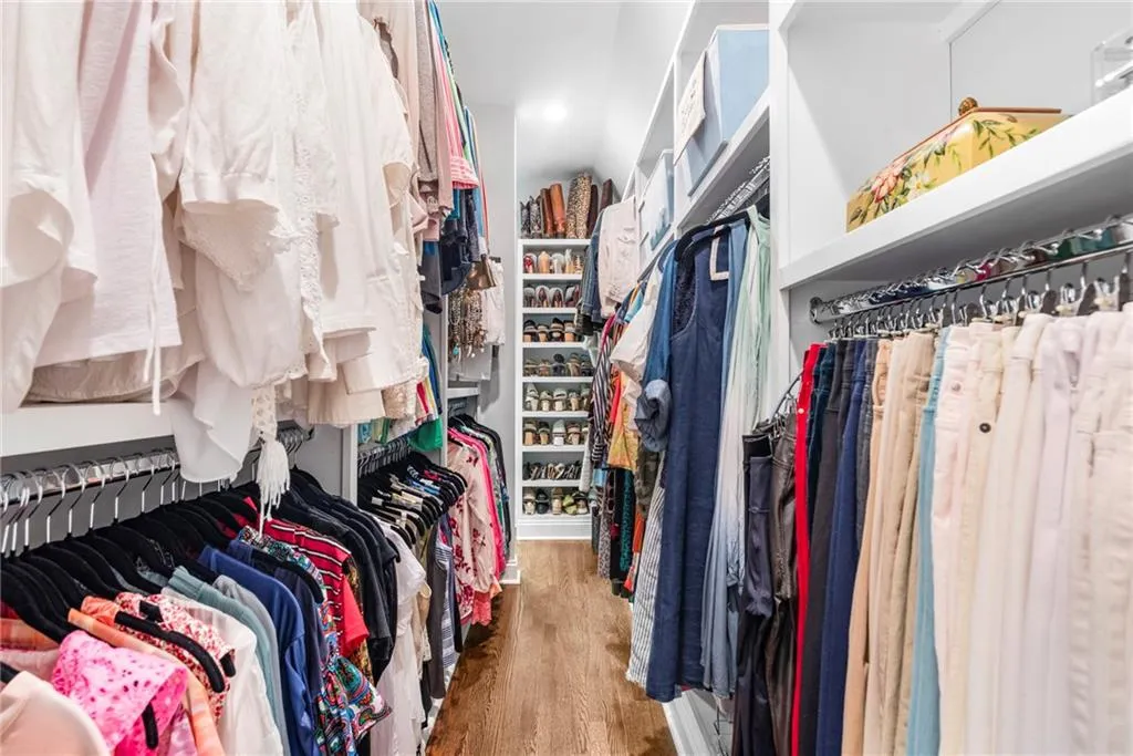 Primary custom walk-in closet Primary custom walk-in closet