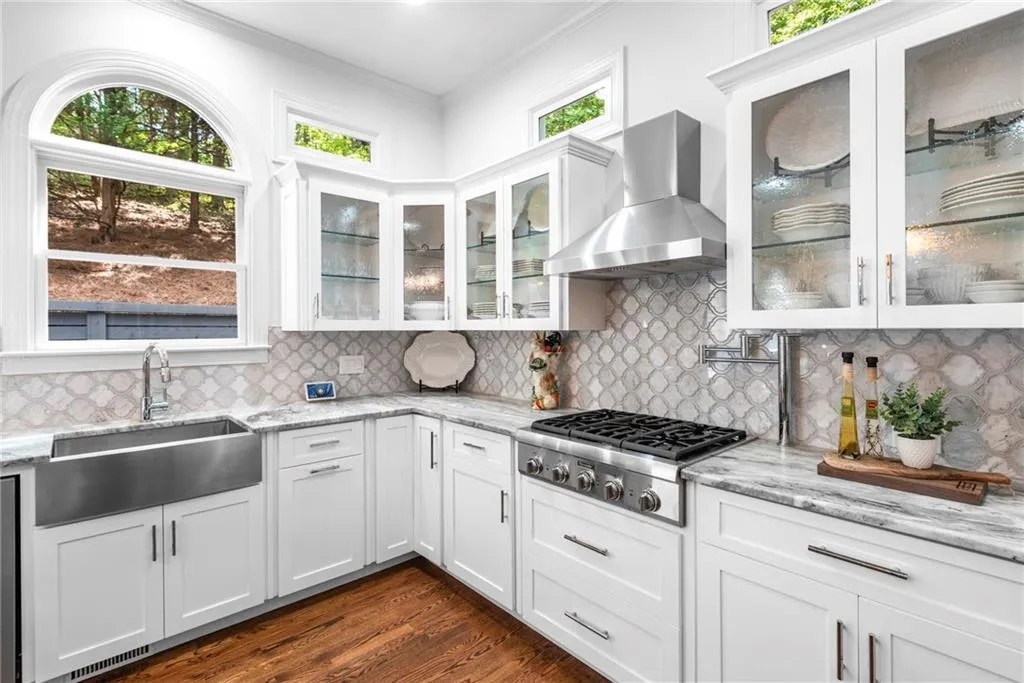 Kitchen featuring stainless steel Thermador 5 burner gas cooktop with (5) Star burners, Thermador double convection ovens, Bosch dishwasher with third rack and LG 4 -door smart compatible French Door Refrigerator with covert 3rd drawer, door within door, water & ice dispenser Kitchen featuring stainless steel Thermador 5 burner gas cooktop with (5) Star burners, Thermador double convection ovens, Bosch dishwasher with third rack and LG 4 -door smart compatible French Door Refrigerator with covert 3rd drawer, door within door, water & ice dispenser