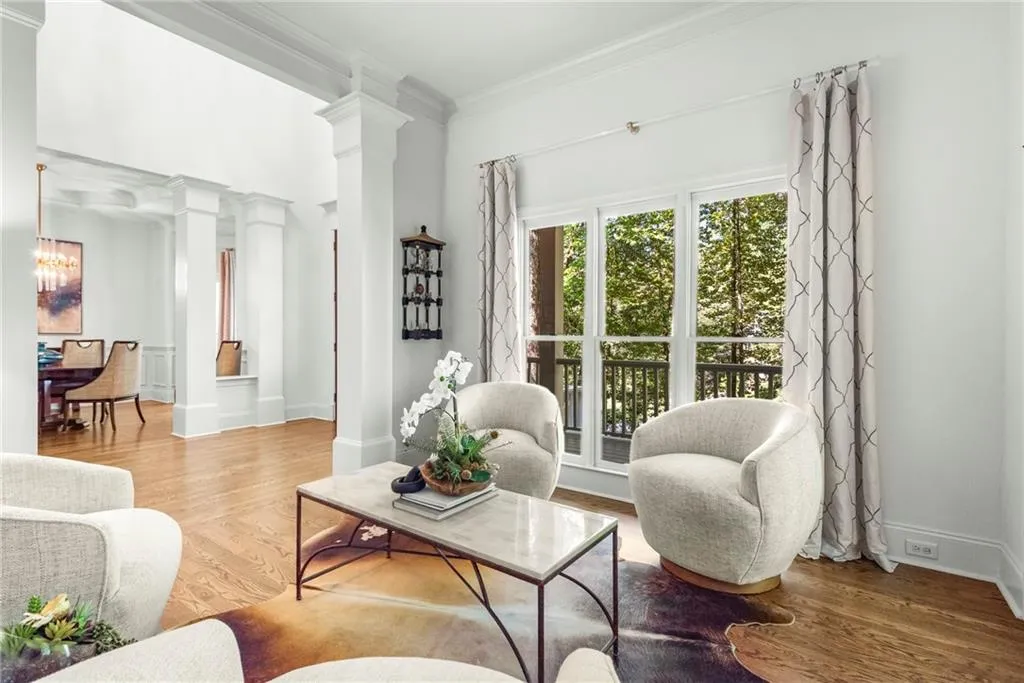 Living/Sitting area featuring  crown molding, hardwood floors Living/Sitting area featuring  crown molding, hardwood floors