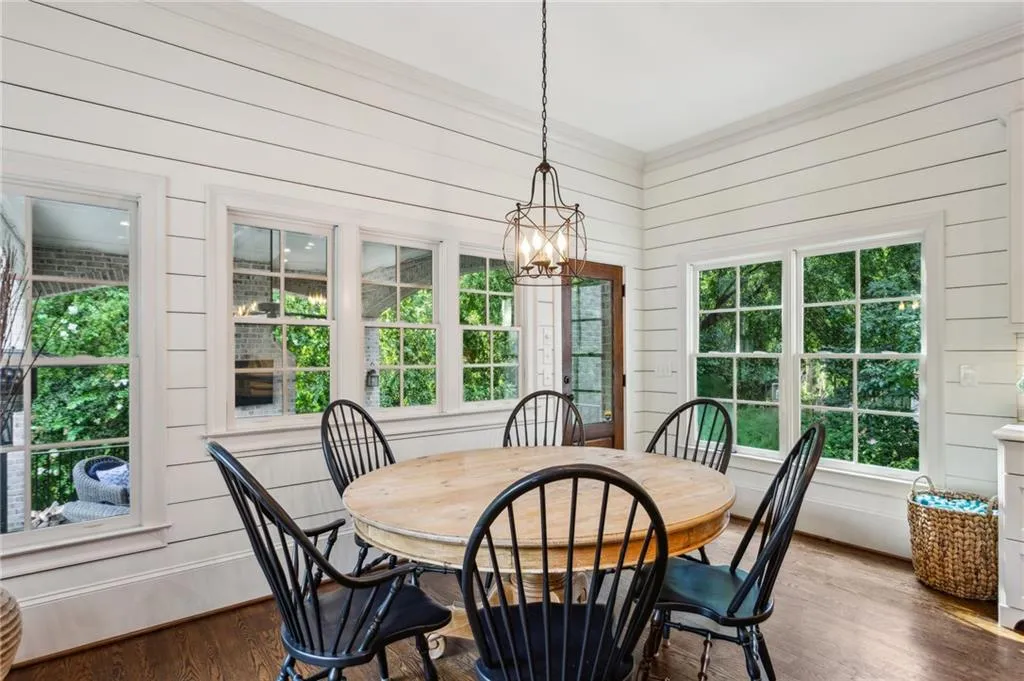 Plenty of room for all in the breakfast area plus door to the back porch and pool