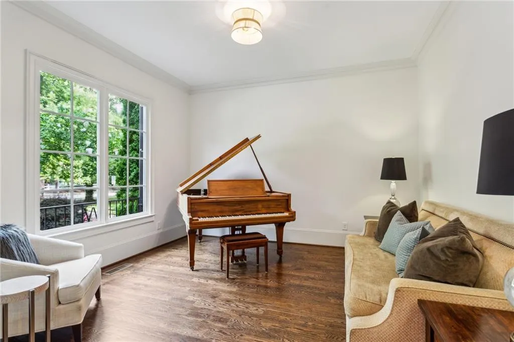 Private living space can be used as formal living room, music room or cozy den