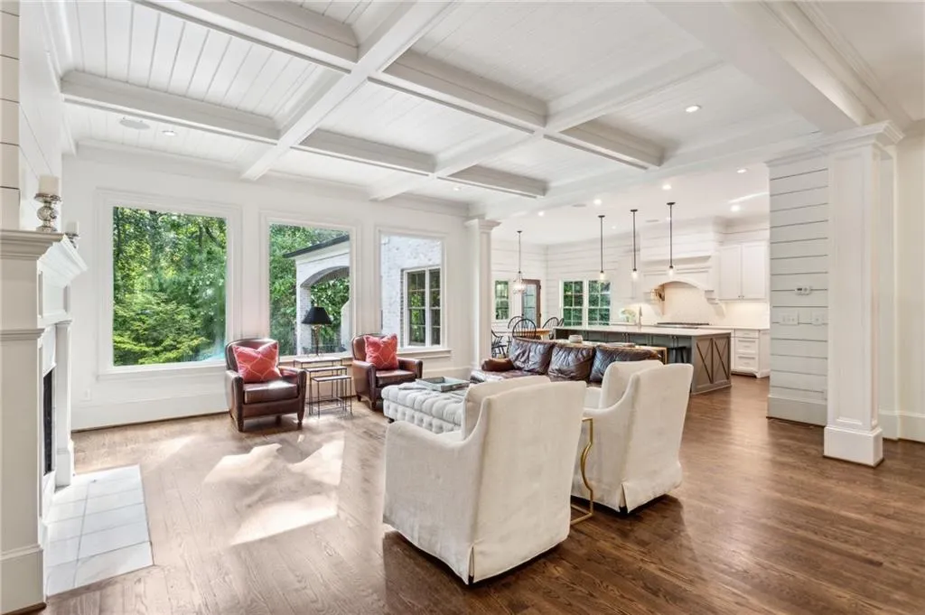 From the foyer you walk into the open family room with large picture windows overlooking the pool and spa