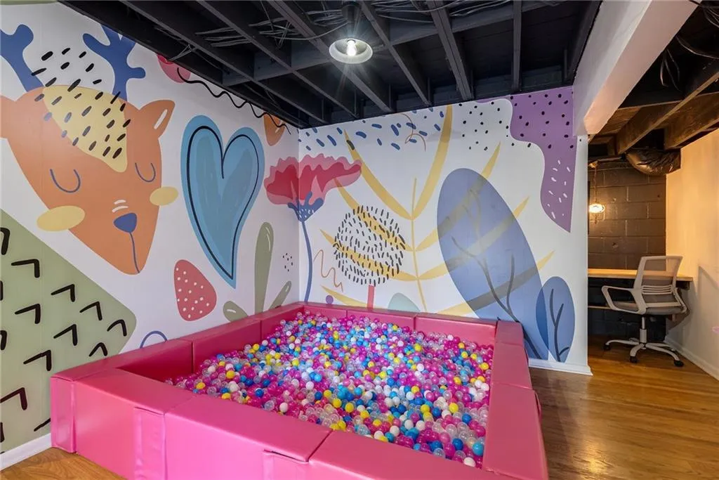 Playroom featuring hardwood / wood-style floors