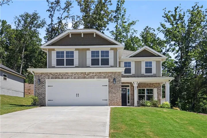 Beautiful front brick, multi accent with board and batten and shakes,  5/3.5 primary on main, level yard, two-car garage, and an inviting covered porch.