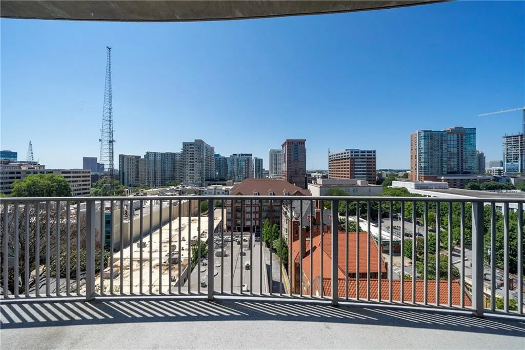 View of over-sized featuring a balcony and a view of skyline