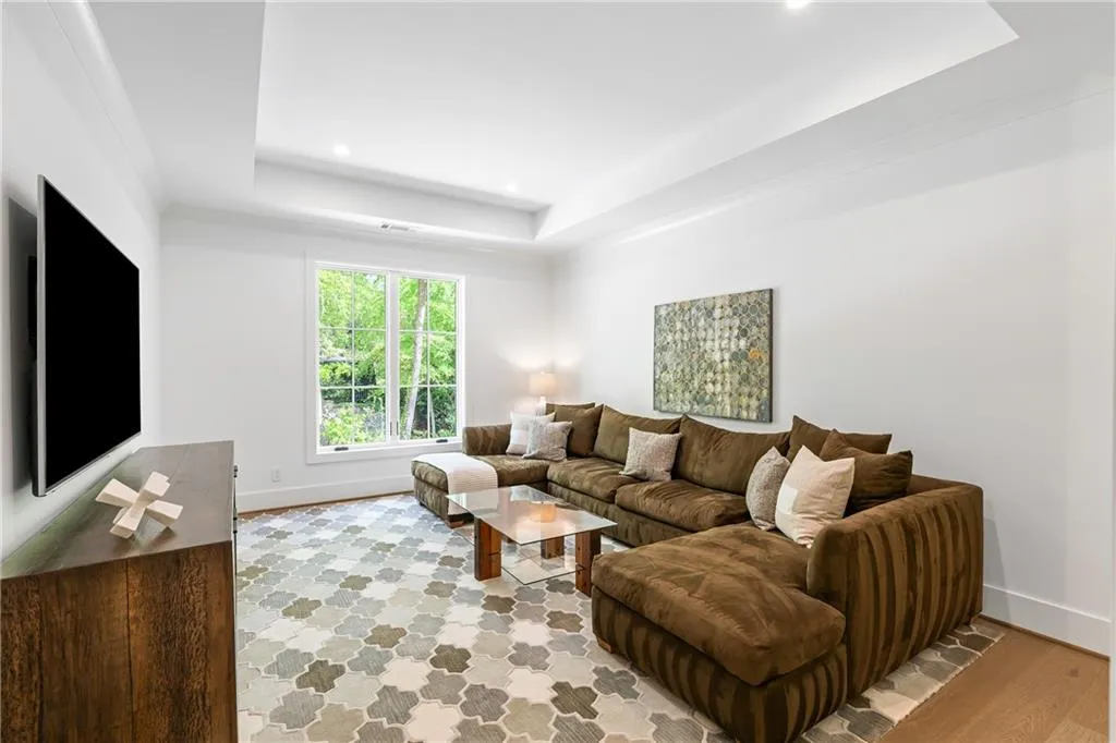 One of four secondary bedrooms with ensuite on the second level, currently being used as rec space