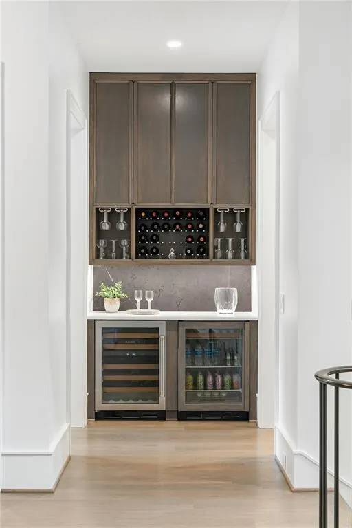 Butlers pantry with wine cooler and beverage cooler