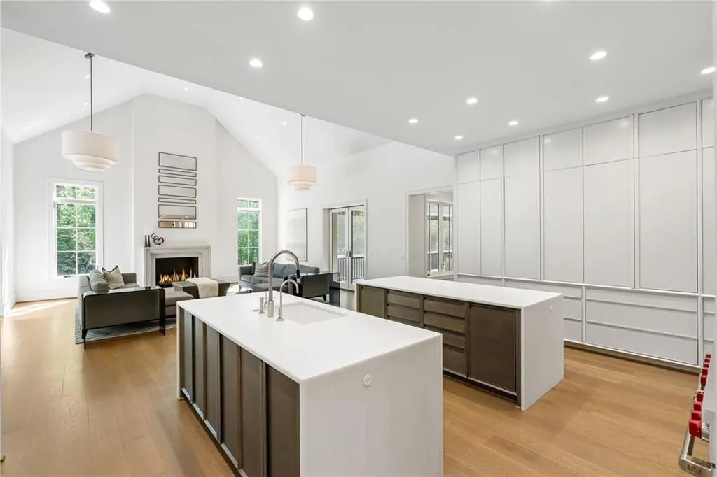 Double islands with two dishwashers, hidden storage and and two trash drawers