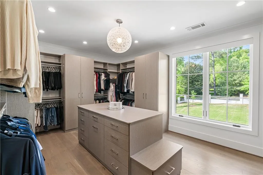 Custom closet in the primary bedroom