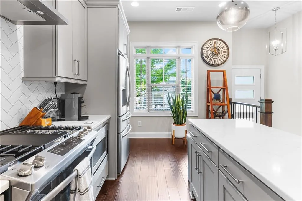 Dining space featuring dark hardwood / wood-style flooring and sink
