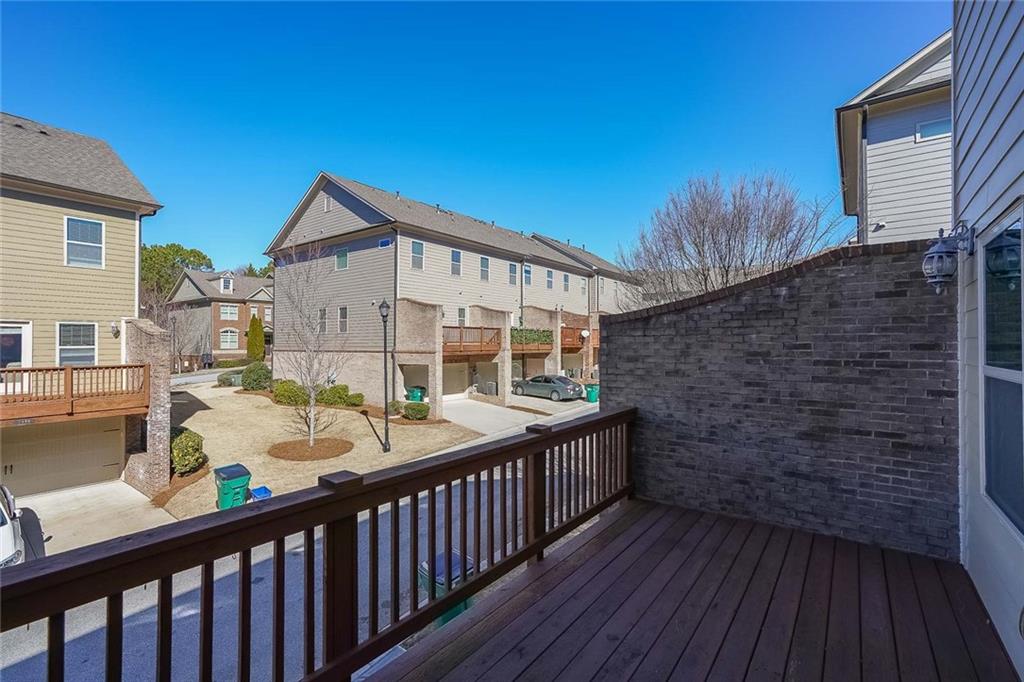 Wooden deck with a patio area
