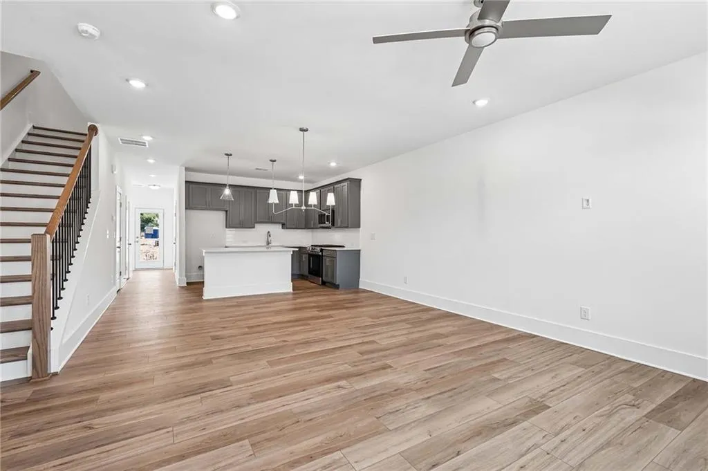 Open Floor Plan Concept with Family Room, Dining Area and Kitchen