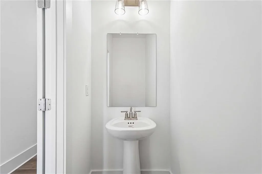 First Floor Powder Room down the Hallway