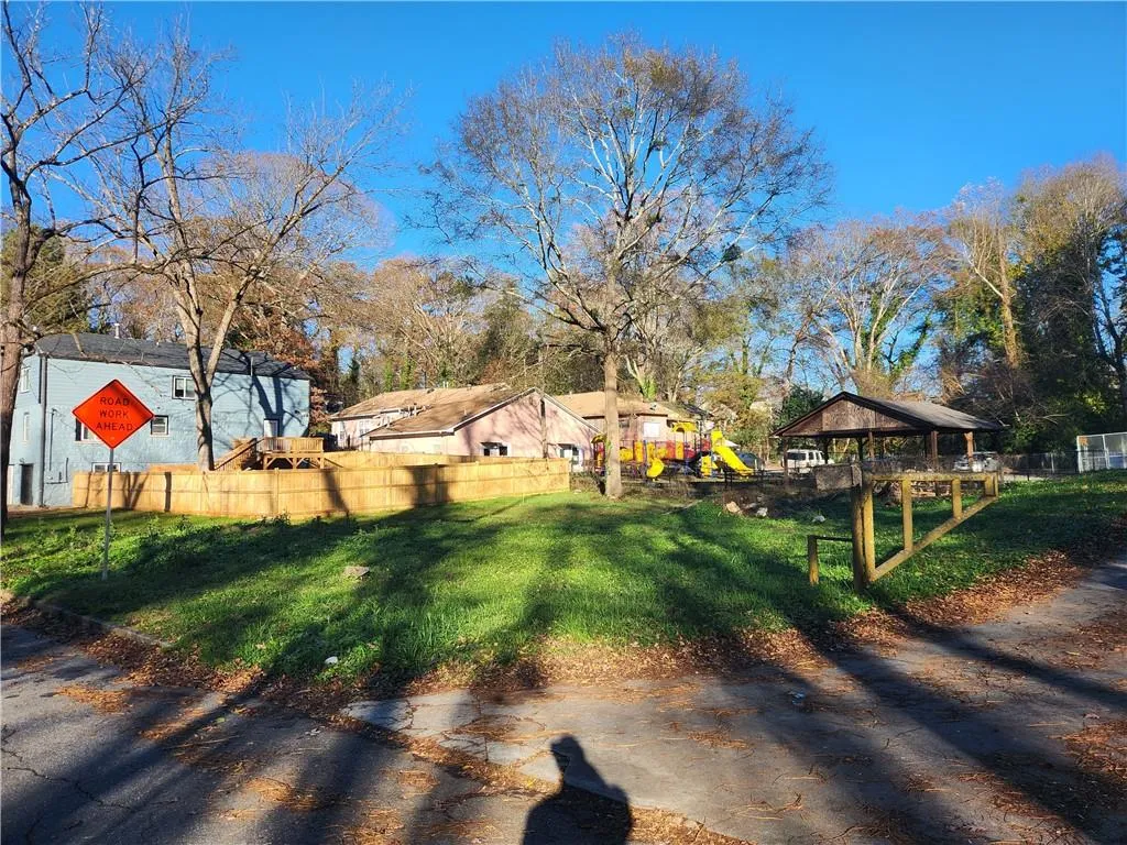 View of yard featuring a playground
