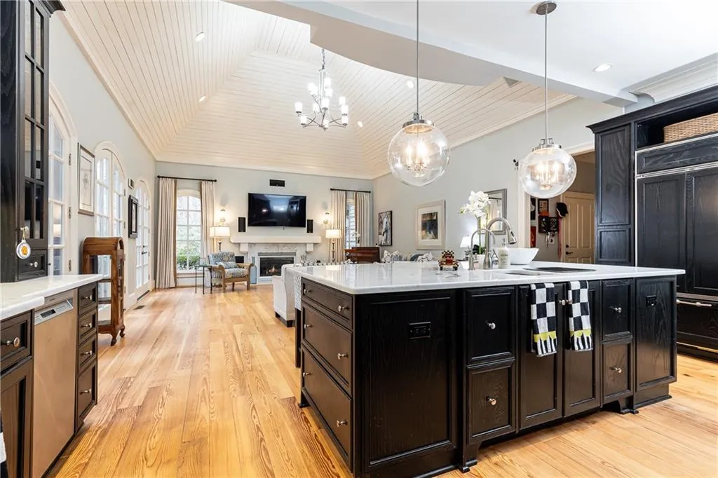 Kitchen looking to Fireside Family Room.