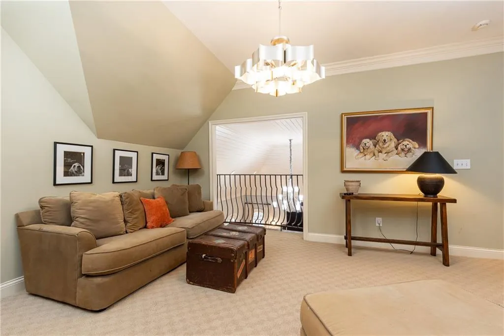 Upper Level Sitting Room overlooks family room below.