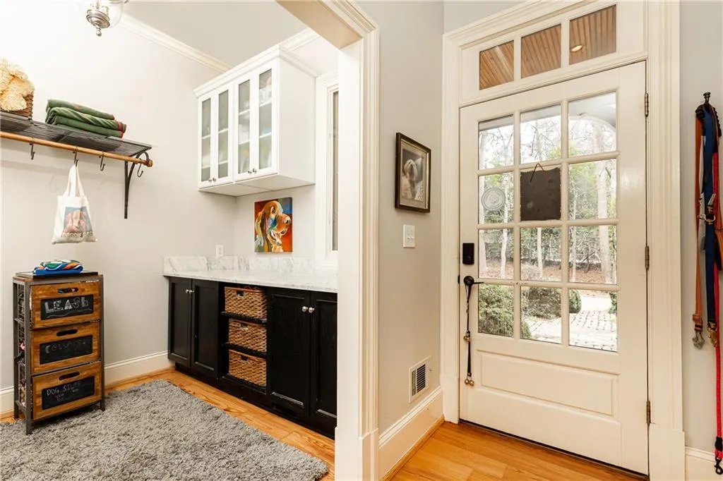 Covered Side Entry and Laundry Room.