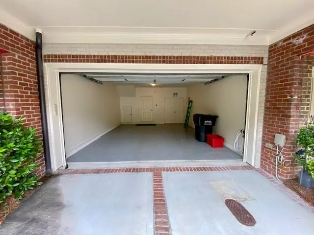 Garage with concrete driveway
