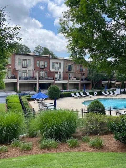 Community pool featuring a patio area