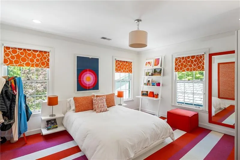 Bedroom featuring ornamental molding and baseboards
