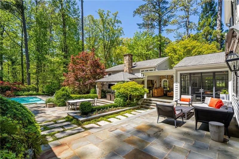 View of patio / terrace with an outdoor living space and an outdoor pool