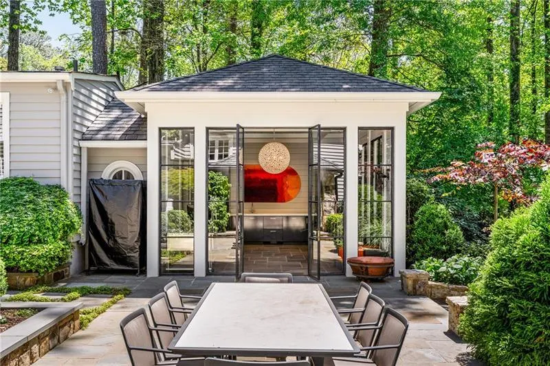 View of outdoor structure with outdoor dining area