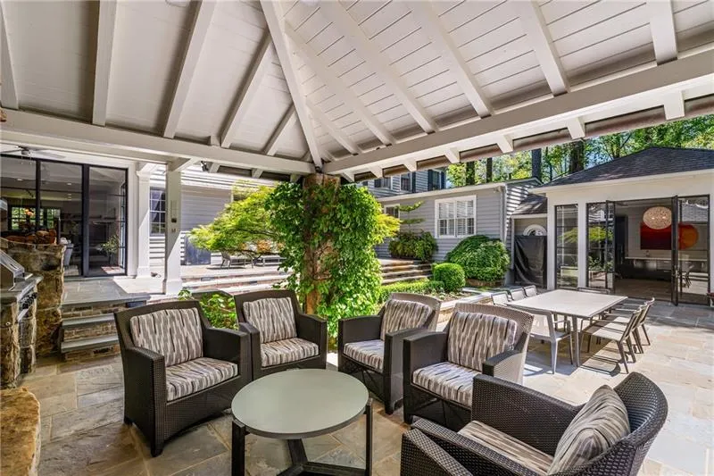 View of patio / terrace featuring a gazebo, an outdoor living space, and outdoor dining area