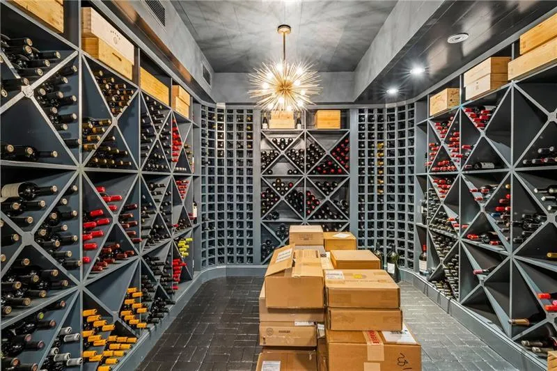 Wine room featuring brick patterned flooring