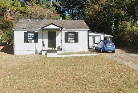 Single-story residence with a covered front entry and a gabled roofline