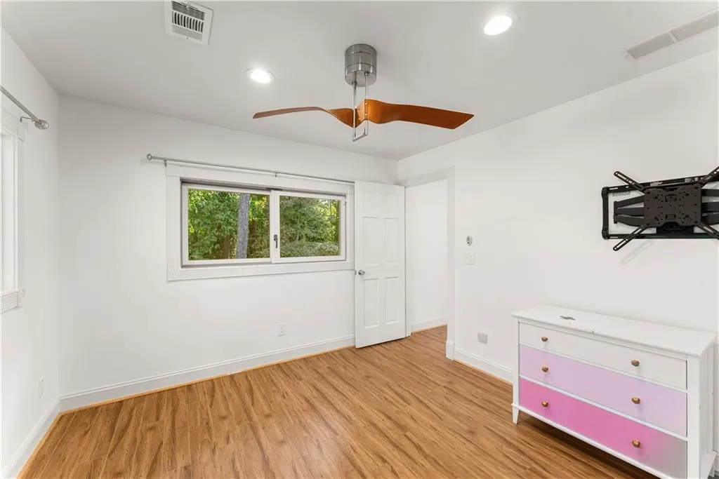 Unfurnished bedroom featuring recessed lighting, light wood-style flooring, and a ceiling fan