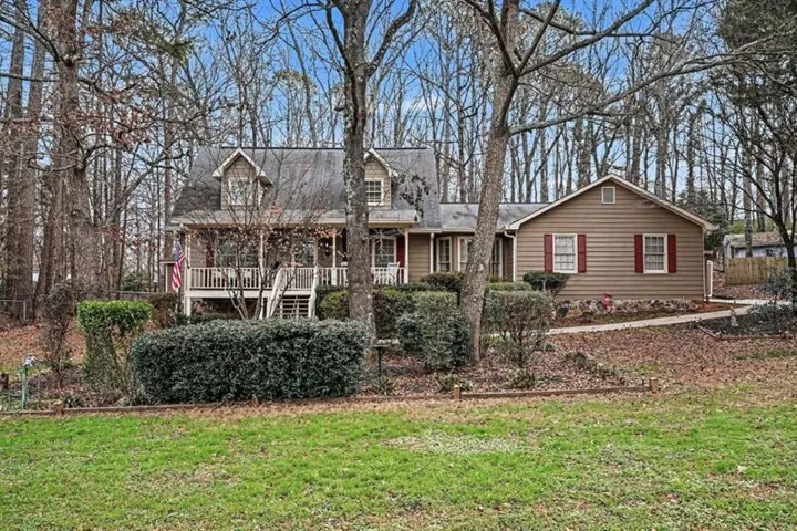Charming Traditional Home nestled on a Large, Wooded, Private Lot in the peaceful community of Stockbridge!