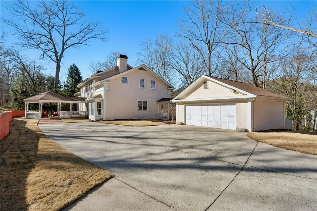 Detached two-car garage with walkway to the house