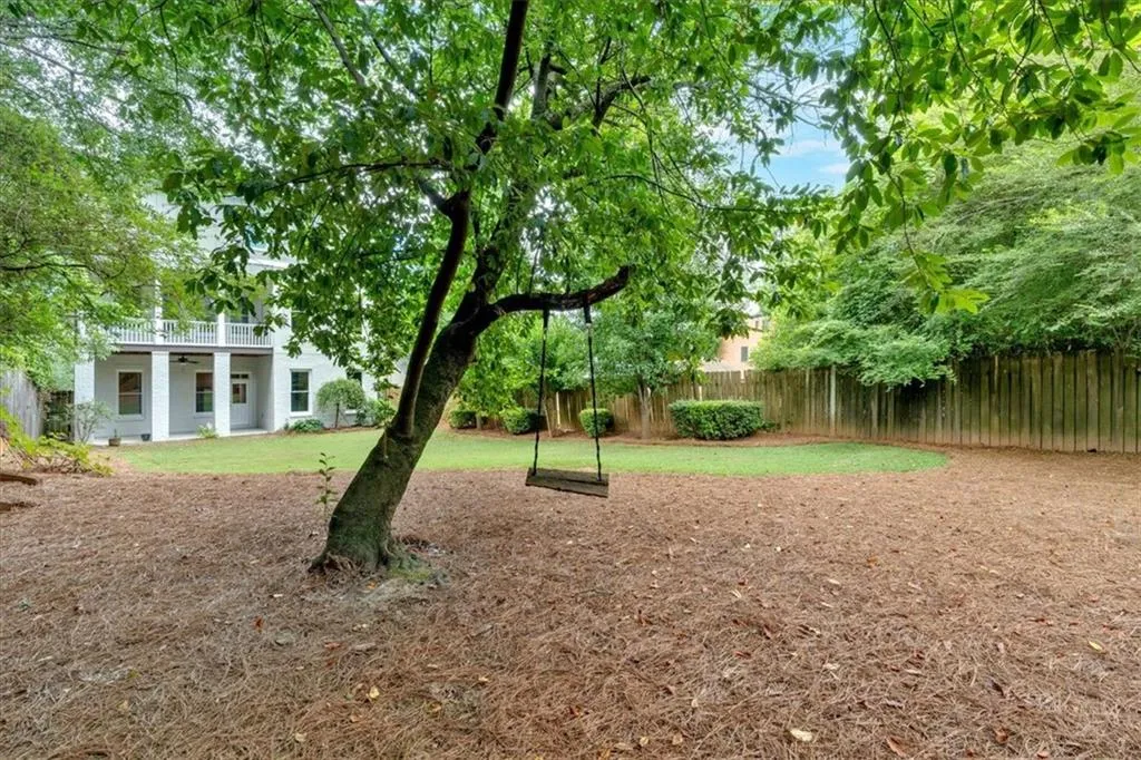 View of fenced backyard