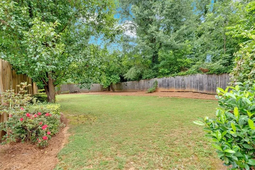 View of fenced backyard