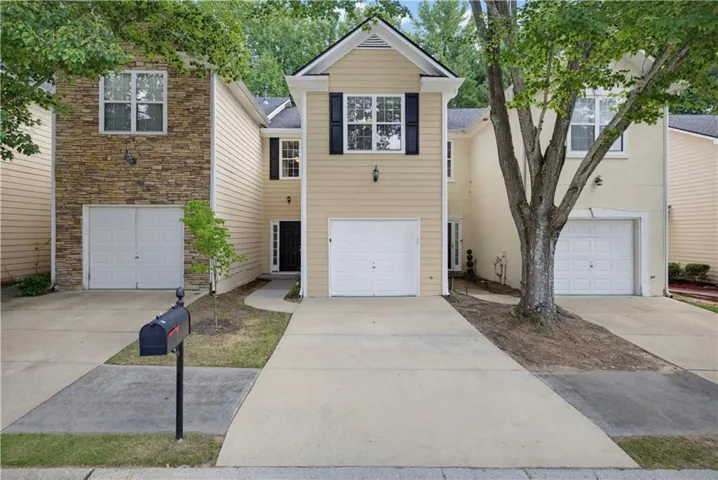 Two-story exterior with siding and stone accents