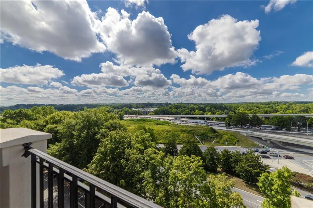 Balcony with a wooded view