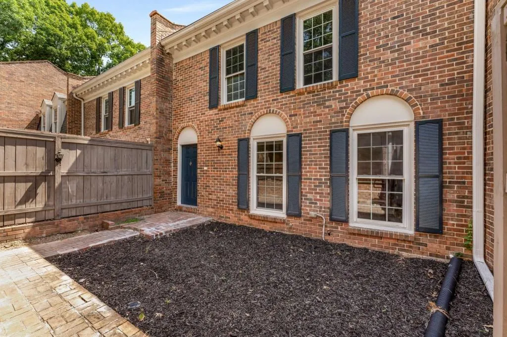 The front courtyard is perfect for a small garden and outdoor seating area