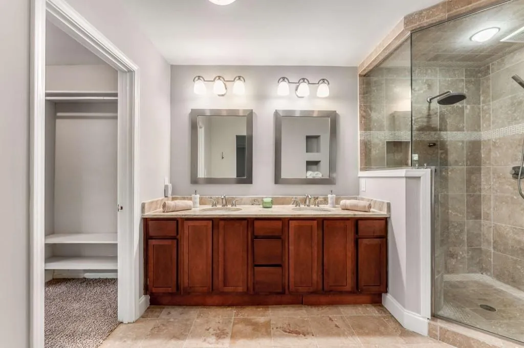 primary bathroom with walk-in closet