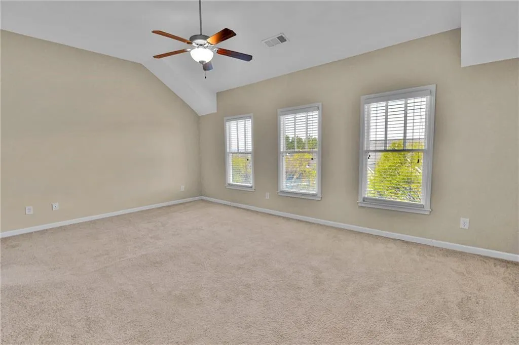 Primary Bedroom with natural lighting